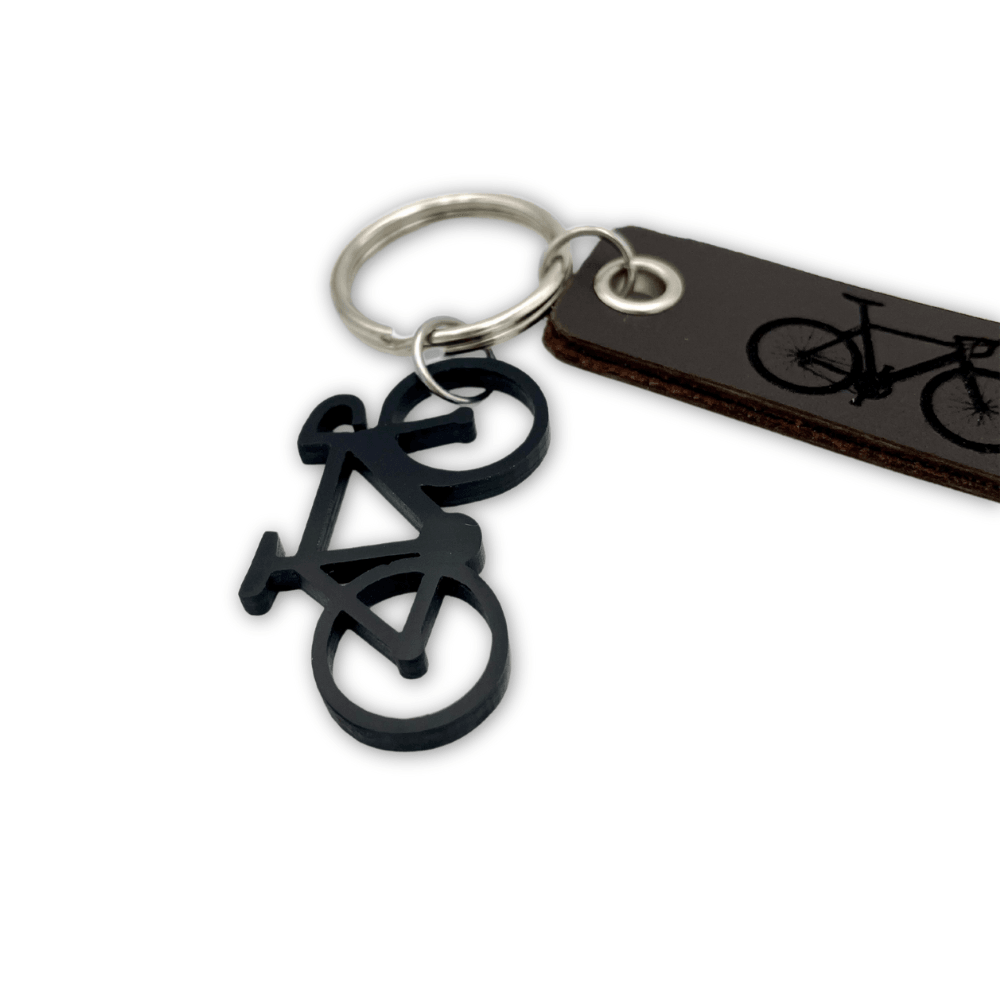 Handmade Leather Keyring with Unique Bicycle Engraving and Silver Finish - GiftShop.lu